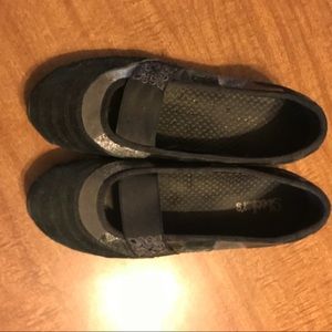 Black suede Skechers